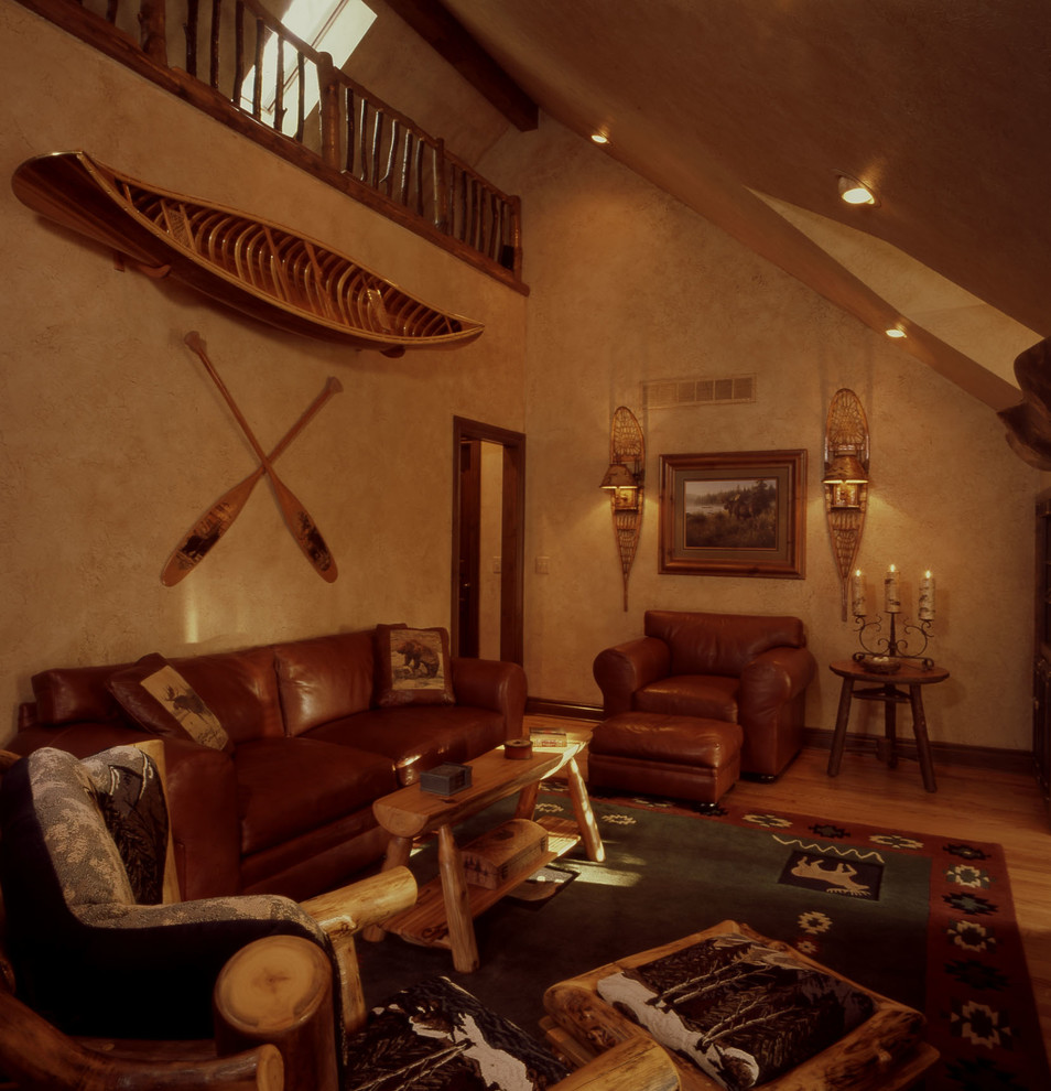 Example of a mountain style living room design in Detroit