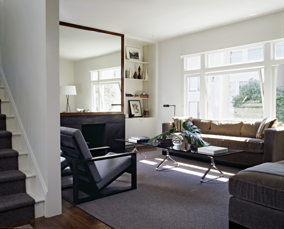 Inspiration for a transitional living room remodel in San Francisco with white walls and a standard fireplace