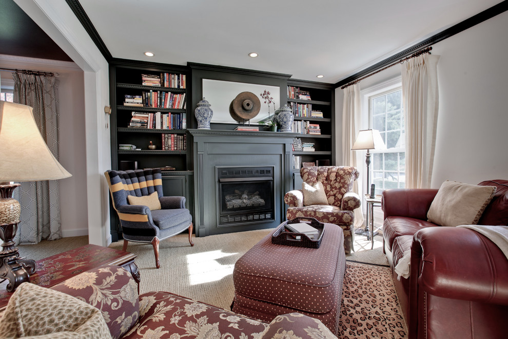 Example of a small classic enclosed carpeted living room library design in Chicago with beige walls, a standard fireplace and no tv