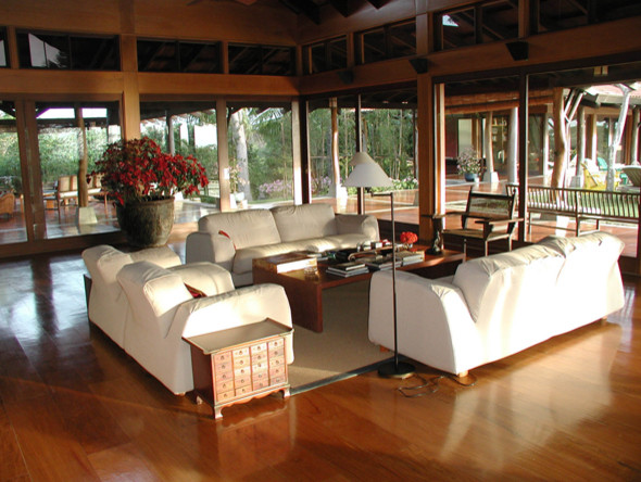 Island style living room photo in Miami