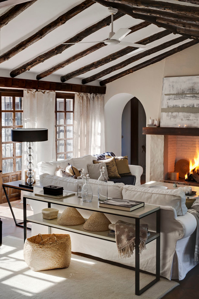 Living room - large cottage formal and enclosed living room idea in Other with a standard fireplace, white walls and no tv