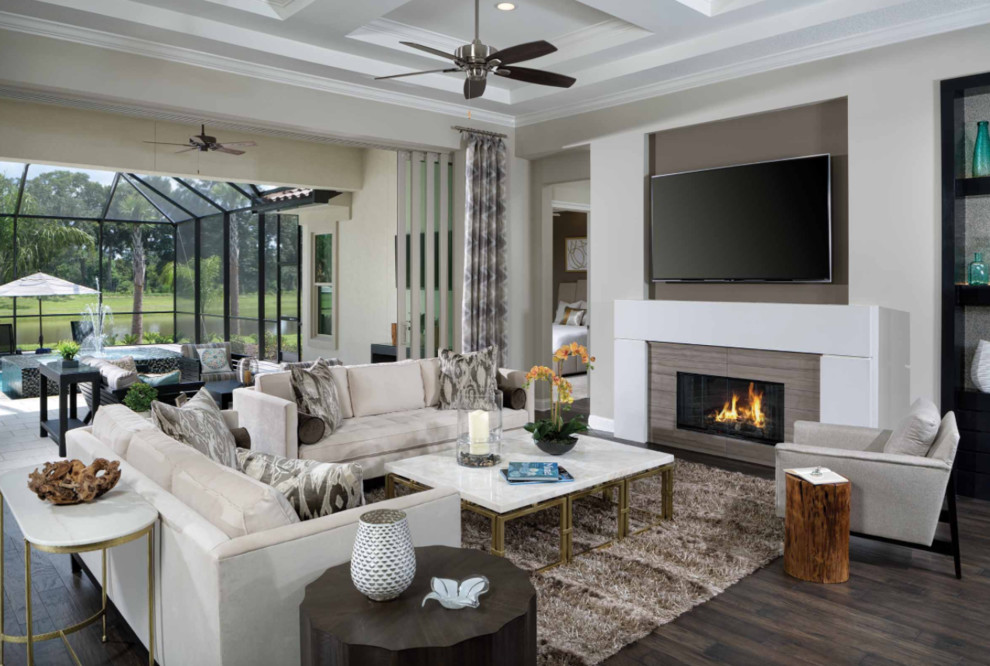 Large transitional open concept dark wood floor and brown floor living room photo in San Diego with beige walls, a ribbon fireplace, a wall-mounted tv and a wood fireplace surround