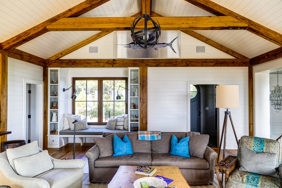 Casual beach living room with exposed wood barn beams - Beach Style ...