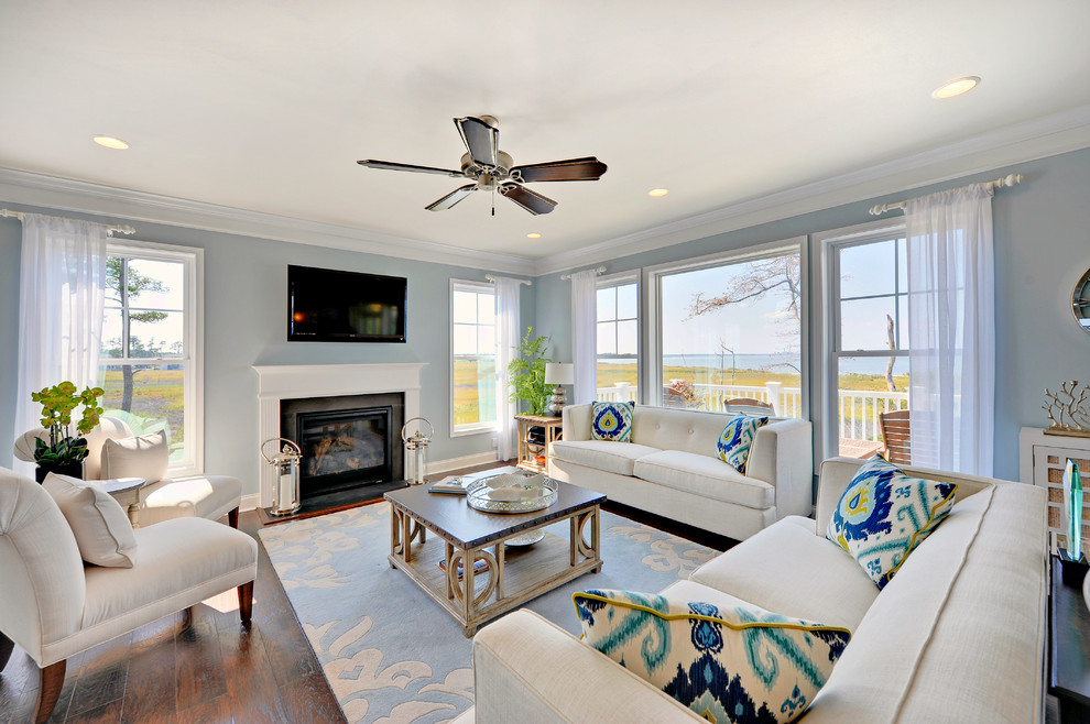 Beach style living room photo in Philadelphia with blue walls