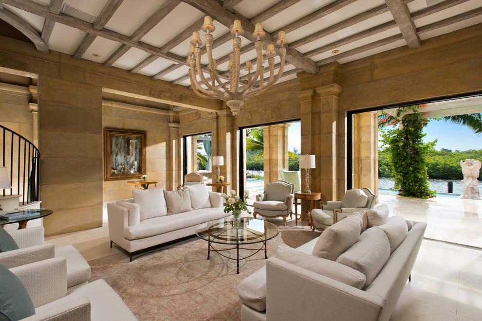 Example of a tuscan beige floor living room design in Miami with brown walls