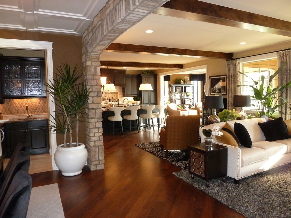 Inspiration for a mid-sized timeless formal and open concept dark wood floor and brown floor living room remodel in Denver with brown walls