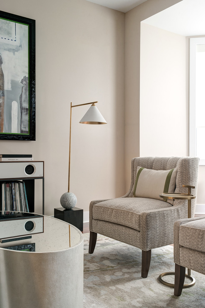 Design ideas for a medium sized modern open plan living room in Philadelphia with beige walls, medium hardwood flooring, no tv and brown floors.