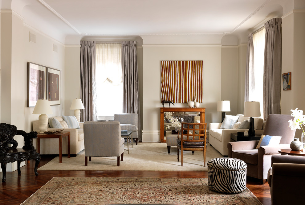 Living room - transitional formal medium tone wood floor living room idea in New York with beige walls