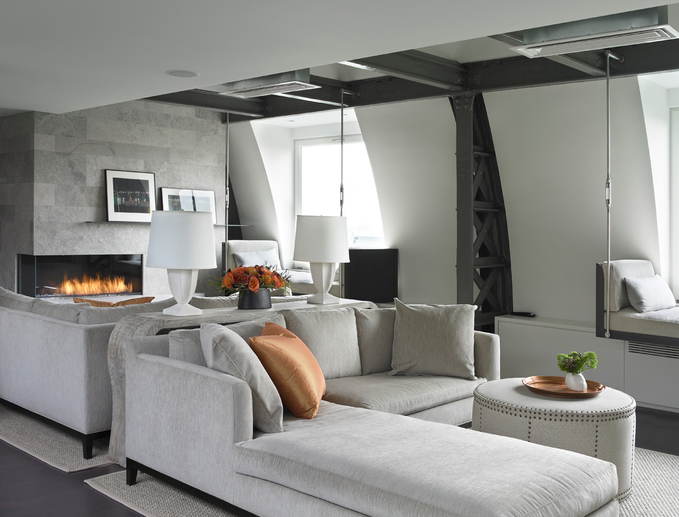 Contemporary living room in New York with a ribbon fireplace.