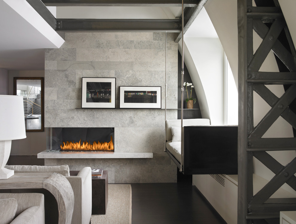 Inspiration for a contemporary living room in New York with grey walls, a ribbon fireplace and feature lighting.