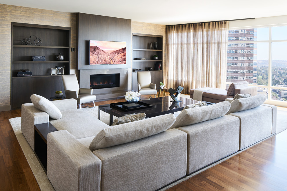 Design ideas for a contemporary living room in Los Angeles with medium hardwood flooring and brown floors.