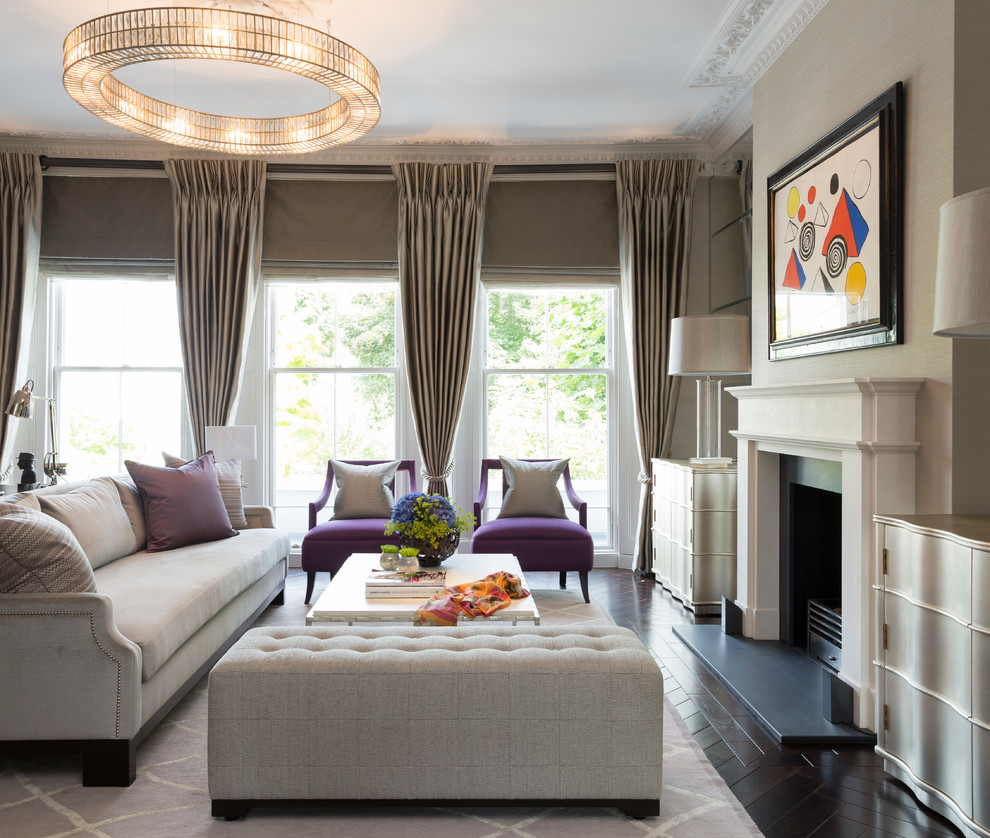 Immagine di un soggiorno chic con sala formale, parquet scuro, camino classico e pavimento marrone