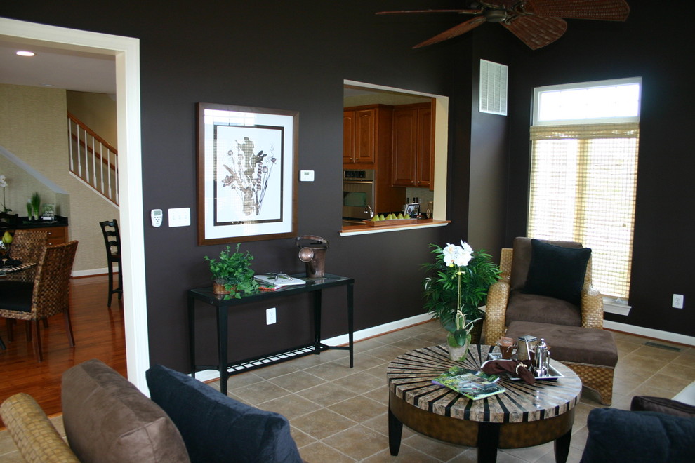 This is an example of a contemporary living room in Baltimore with brown walls.