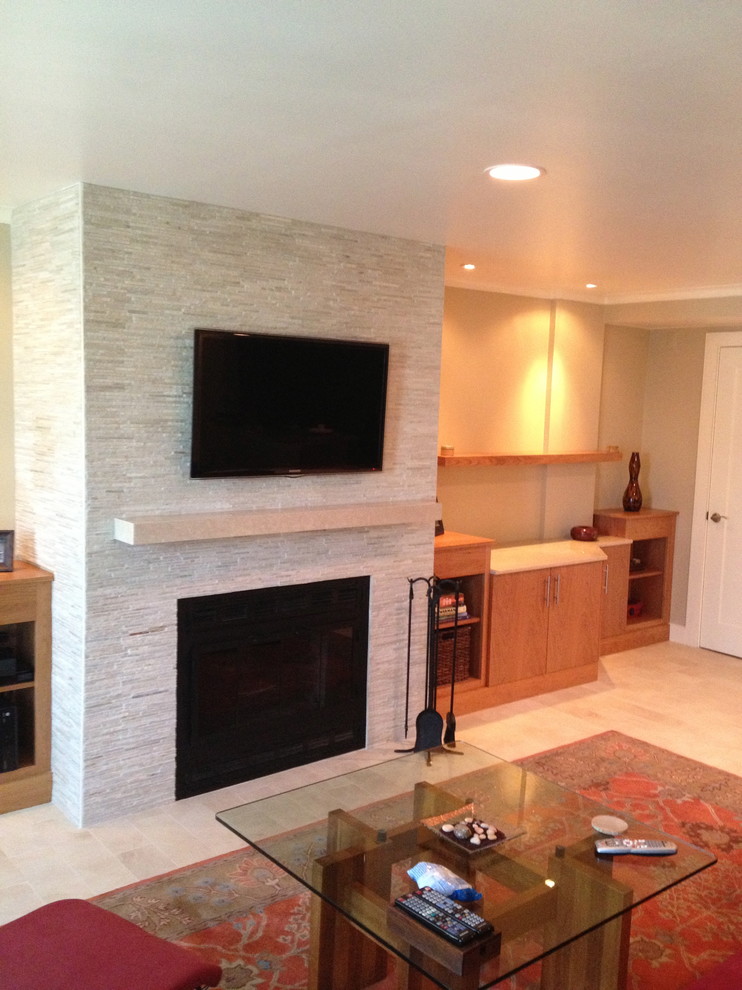 Inspiration for a large contemporary formal and open concept ceramic tile living room remodel in Boston with beige walls, a standard fireplace, a stone fireplace and a wall-mounted tv