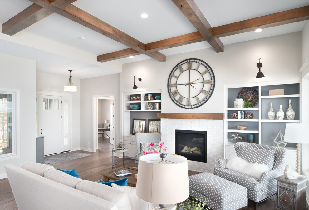 Mid-sized beach style open concept light wood floor living room photo in Wichita with beige walls, a standard fireplace and a brick fireplace
