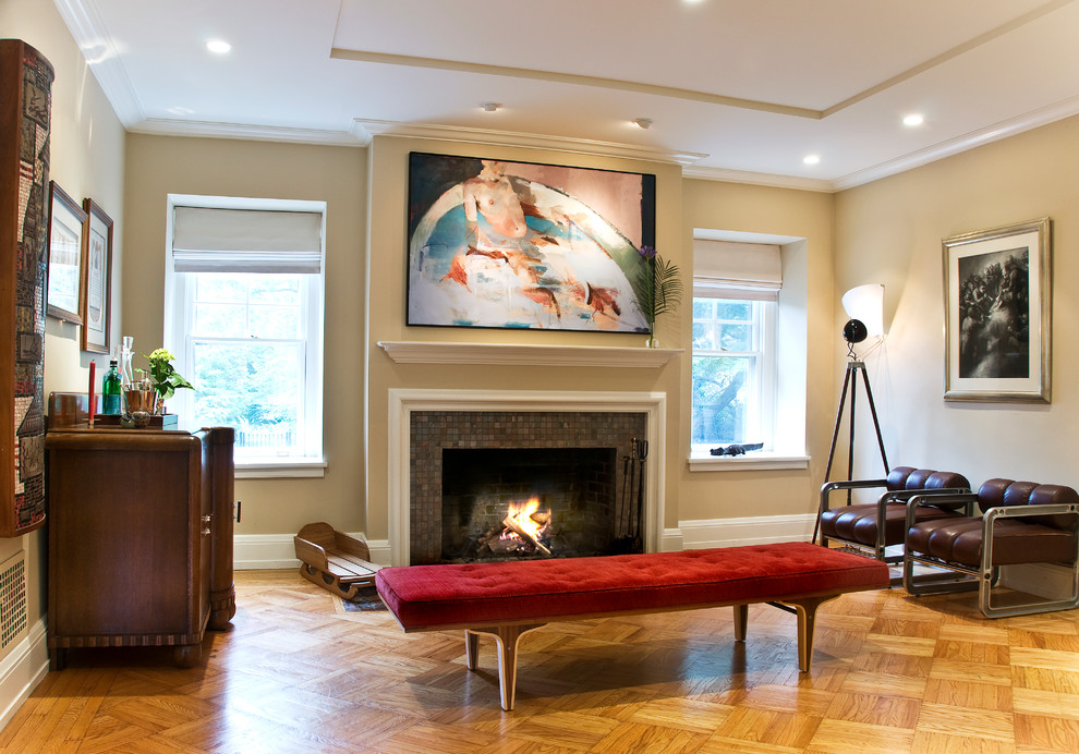 Large elegant open concept medium tone wood floor living room photo in Philadelphia with a bar, beige walls, a standard fireplace and a tile fireplace