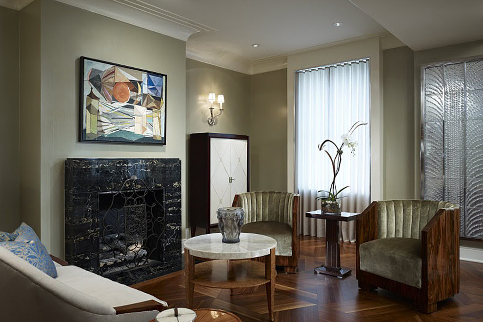 Trendy dark wood floor living room photo in Chicago with a standard fireplace