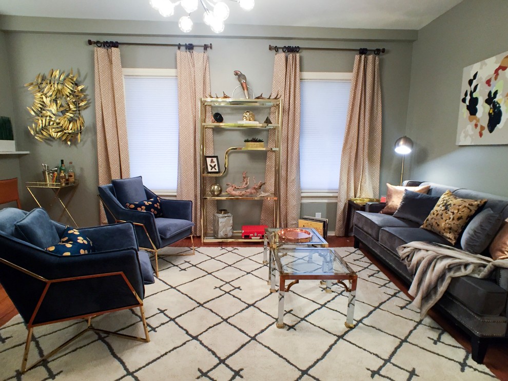 Small classic enclosed living room in Chicago with grey walls and light hardwood flooring.