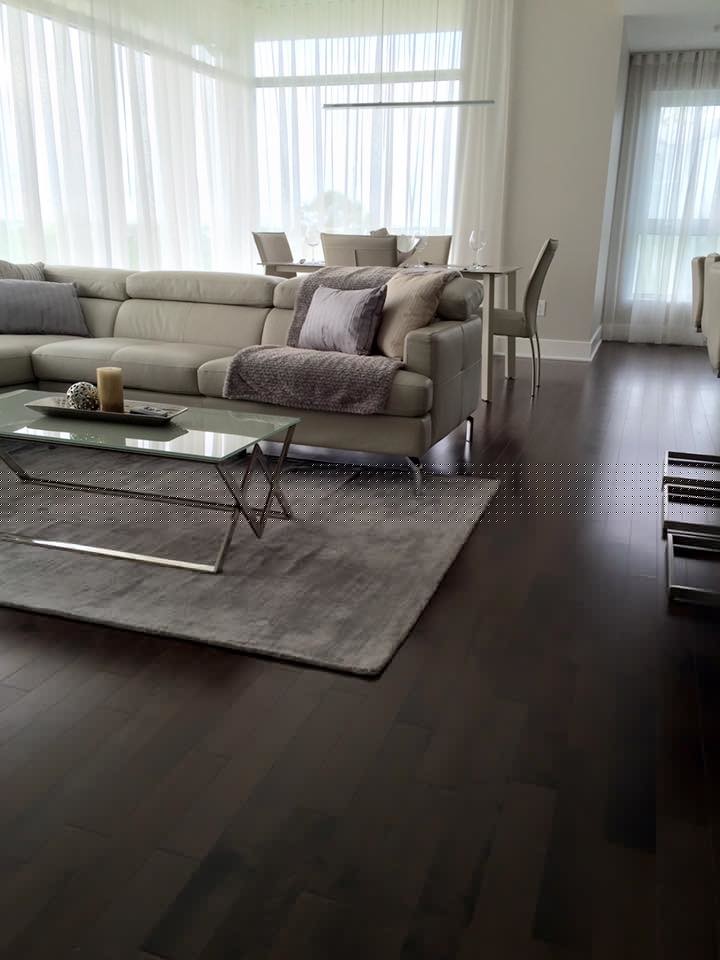 Inspiration for a mid-sized modern formal and open concept dark wood floor and brown floor living room remodel in Other with white walls, no tv, a standard fireplace and a metal fireplace