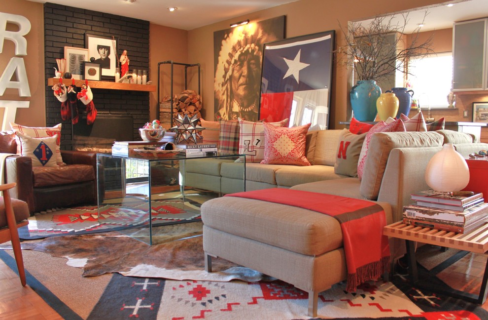 Eclectic living room photo in Dallas with a standard fireplace and a brick fireplace