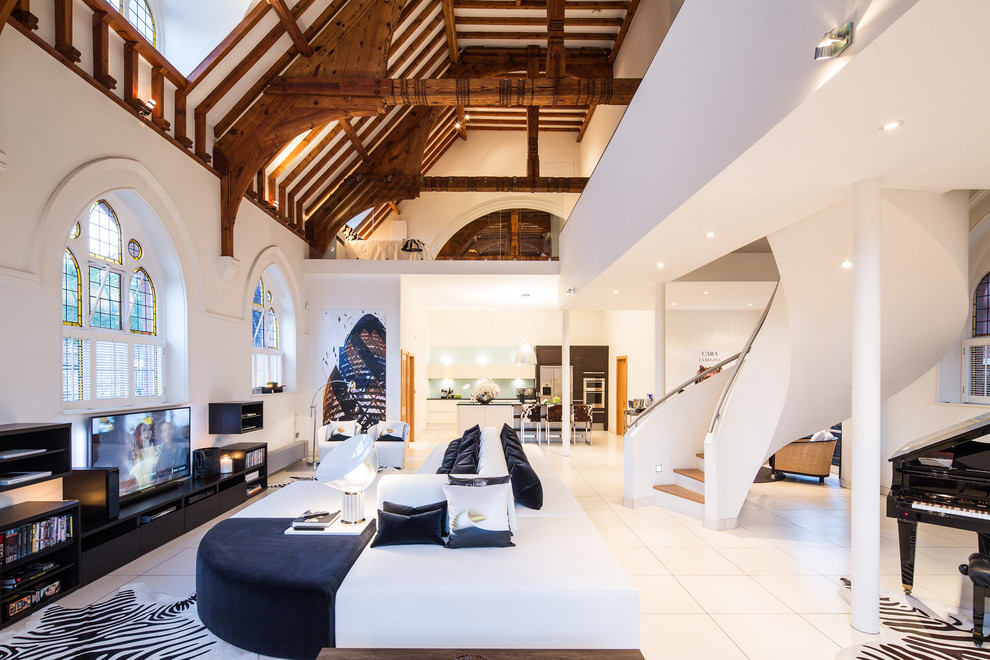 Photo of an expansive modern open plan living room in London with white walls and ceramic flooring.