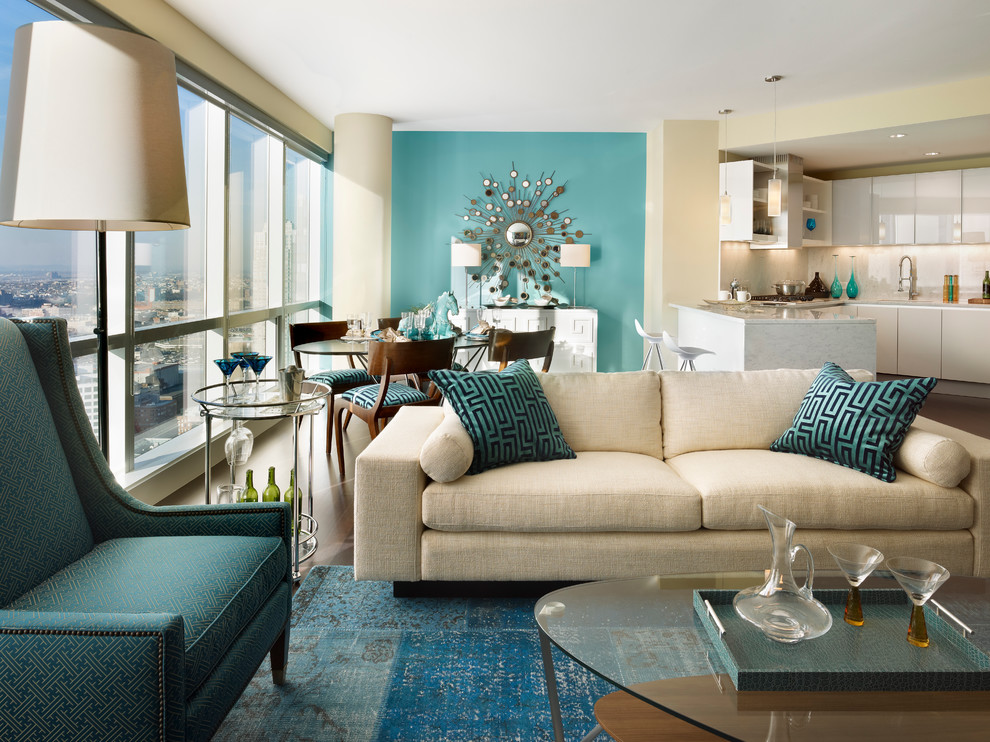 Small trendy open concept living room photo in New York with blue walls