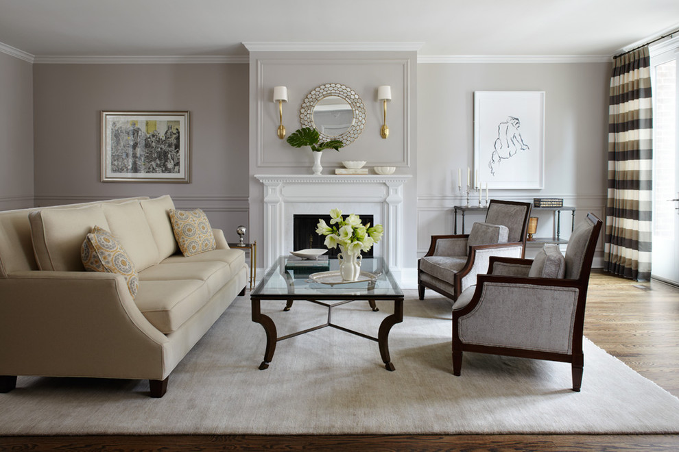 Living room - large traditional formal and enclosed medium tone wood floor and brown floor living room idea in Chicago with gray walls, a standard fireplace and a stone fireplace