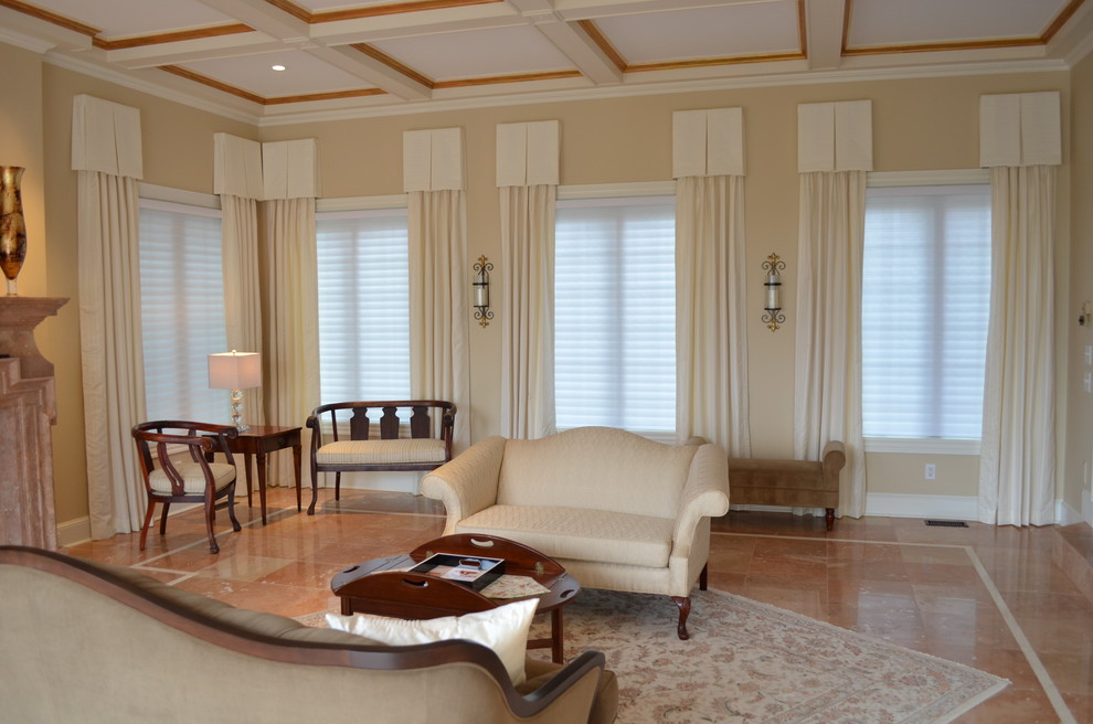 Esempio di un grande soggiorno chic chiuso con pareti beige, pavimento in marmo, camino classico, cornice del camino in pietra e sala formale
