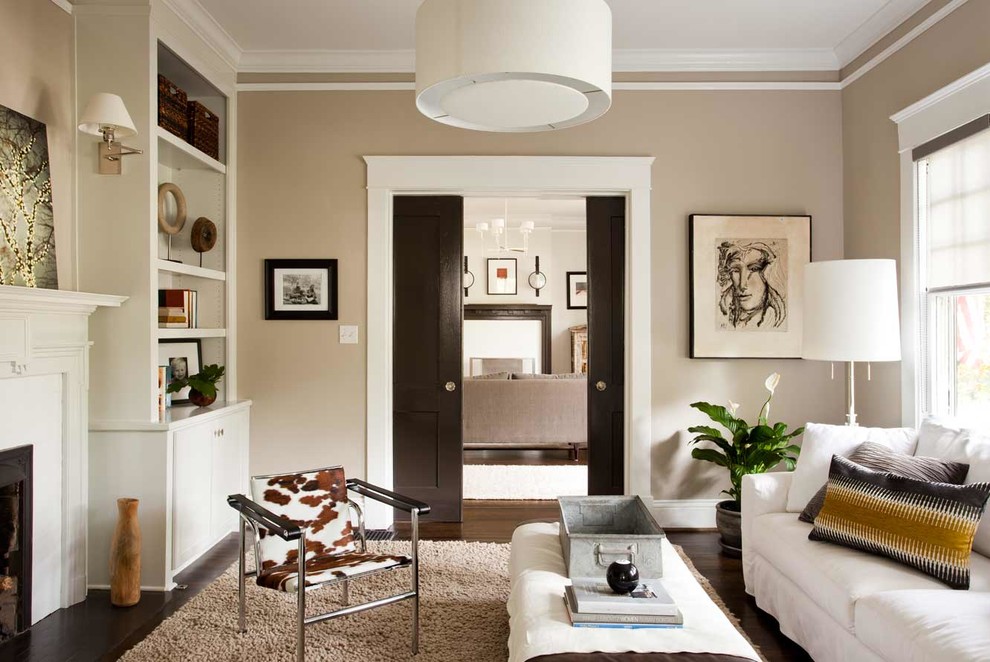 Living room - mid-sized contemporary enclosed dark wood floor living room idea in Atlanta with beige walls