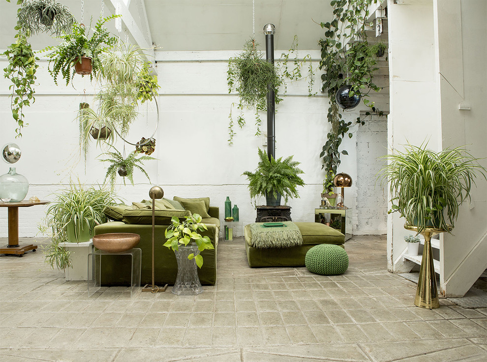 Eclectic gray floor living room photo in London with white walls