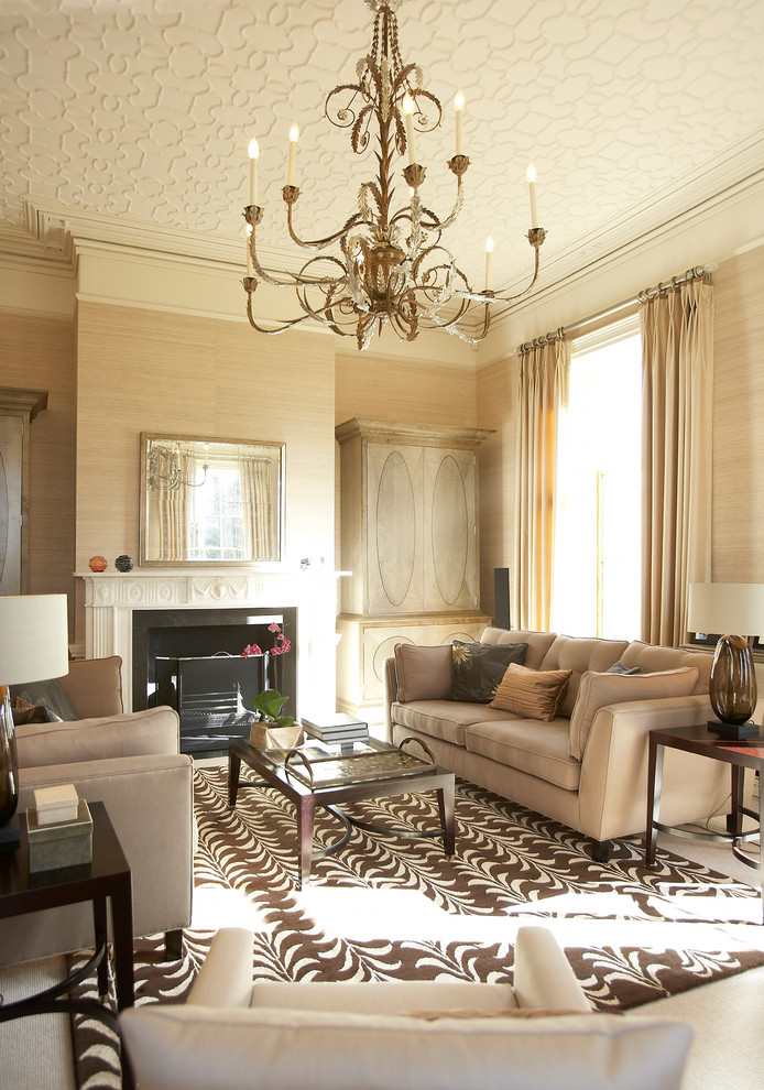 Inspiration for a traditional formal living room in West Midlands with beige walls, a standard fireplace and no tv.