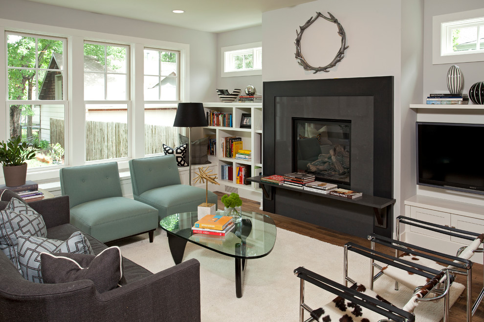 Источник вдохновения для домашнего уюта: гостиная комната среднего размера в современном стиле с серыми стенами и стандартным камином
