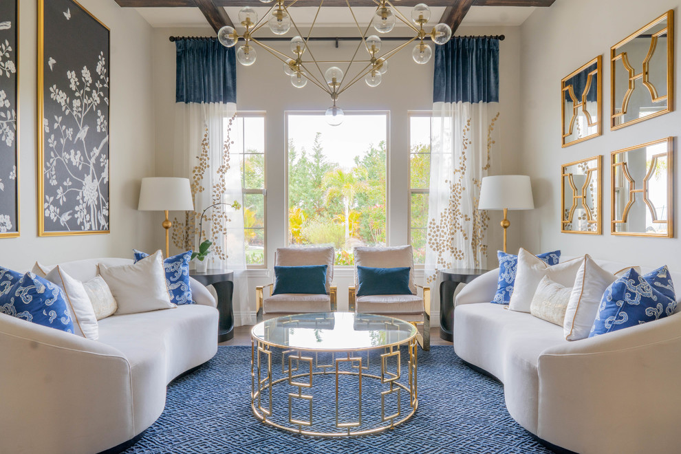 Inspiration for a transitional formal light wood floor and beige floor living room remodel in San Diego with white walls and no tv