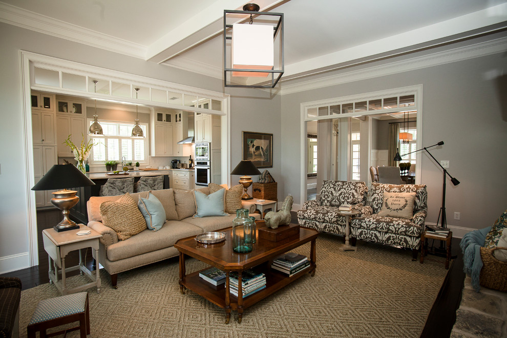 This is an example of a medium sized classic formal open plan living room in Atlanta with beige walls, dark hardwood flooring and no fireplace.