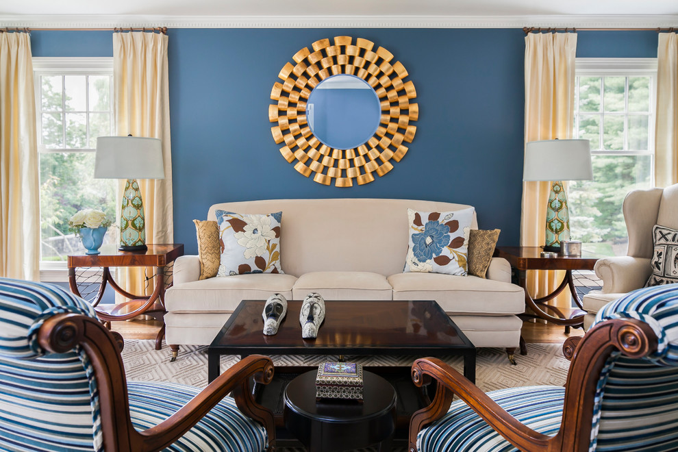 Imagen de salón para visitas tradicional renovado con paredes azules