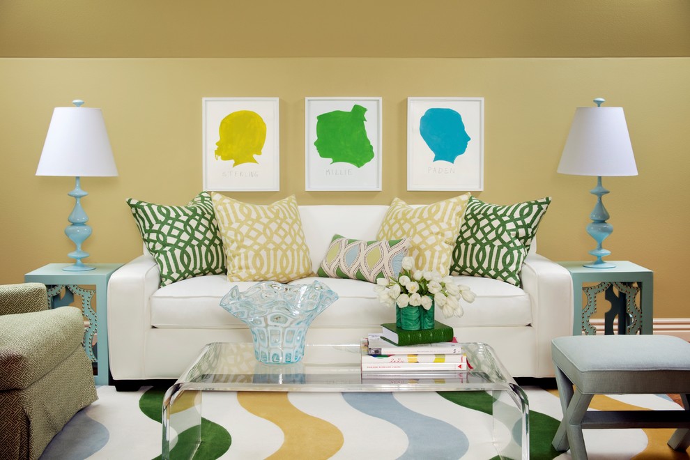 Inspiration for a large timeless open concept medium tone wood floor living room remodel in Little Rock with yellow walls