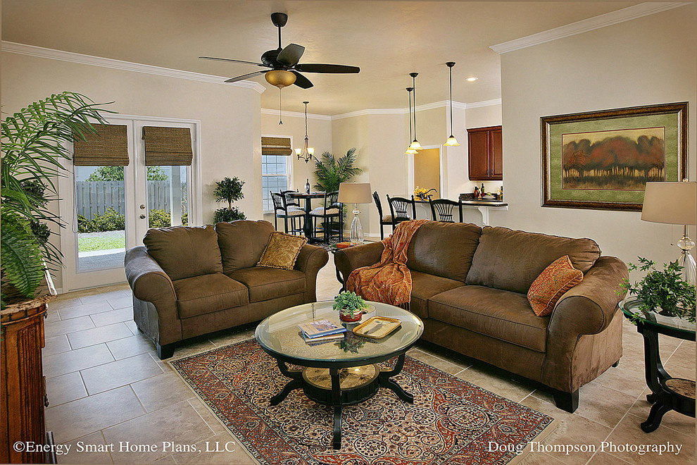 Living room - mid-sized traditional open concept living room idea in Orlando with beige walls, no fireplace and a wall-mounted tv