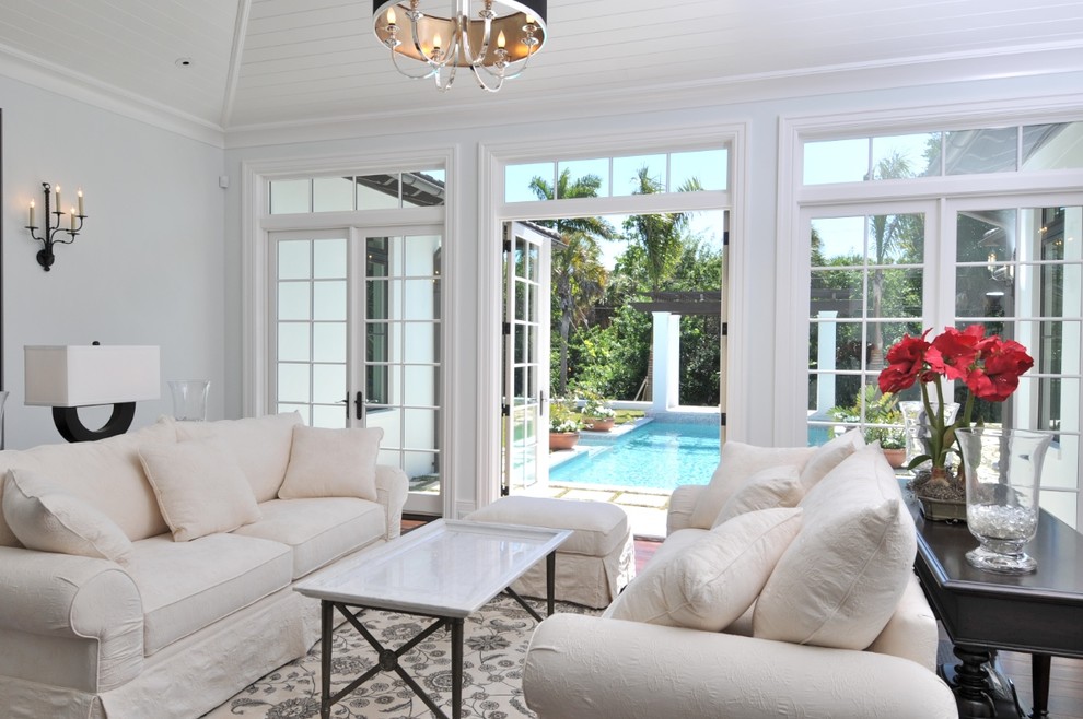 Island style living room photo in Tampa