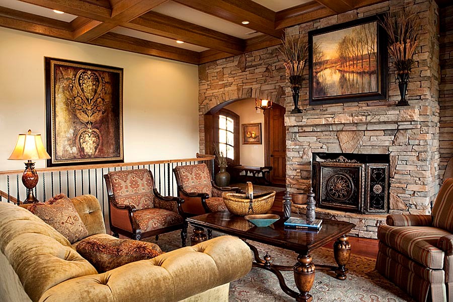 Diseño de salón abierto tradicional con paredes beige, suelo de madera oscura, todas las chimeneas y marco de chimenea de ladrillo