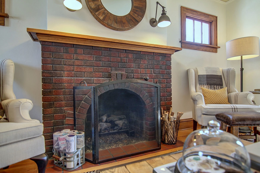 Close-up of home's original brick fireplace with ceramic tile hearth