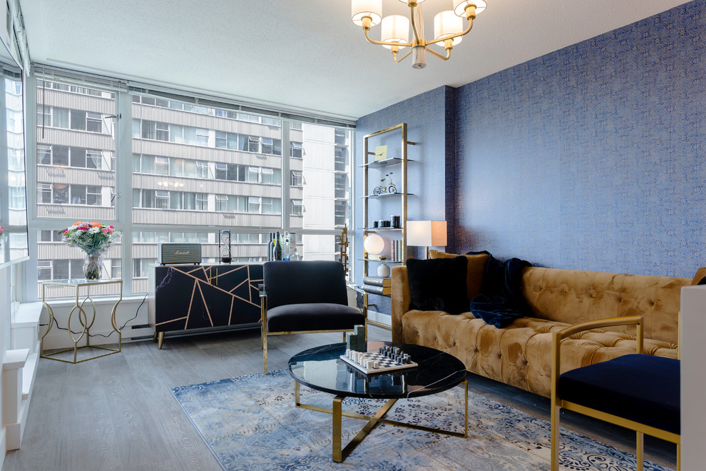 На фото: парадная, изолированная гостиная комната среднего размера в современном стиле с синими стенами, паркетным полом среднего тона и коричневым полом без камина, телевизора