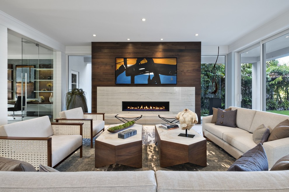 Huge trendy formal and enclosed living room photo in Miami with a ribbon fireplace and a stone fireplace