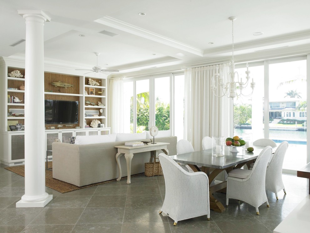 Photo of a large traditional open plan living room in New York with limestone flooring and a built-in media unit.