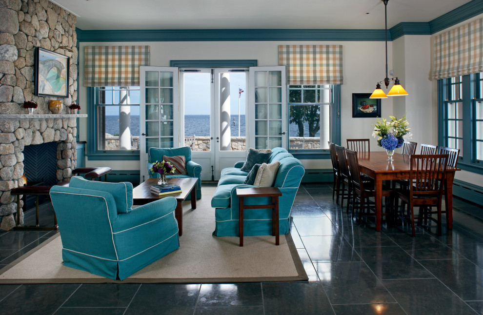 Coastal grey and teal living room in Boston with a standard fireplace.