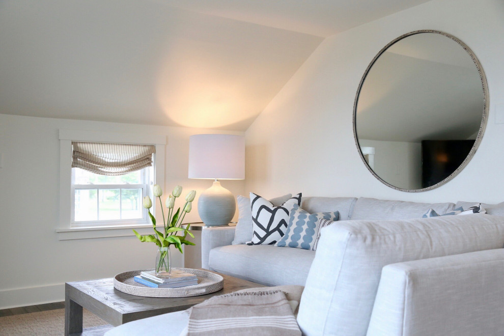 Example of a small beach style open concept gray floor living room design in Boston with white walls and a wall-mounted tv