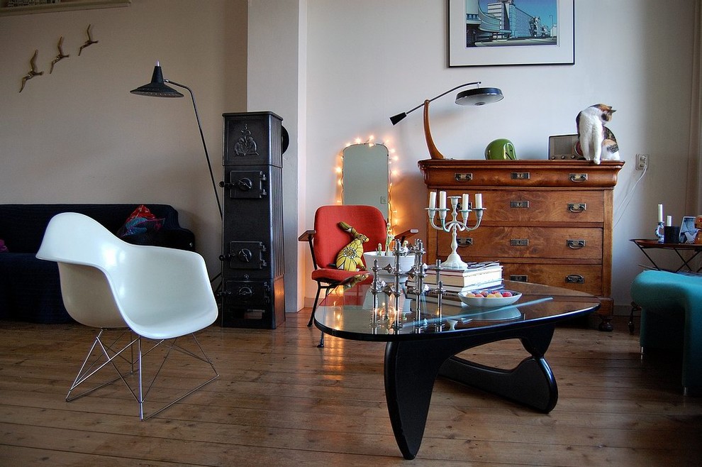 Example of a 1960s living room design in Amsterdam with white walls