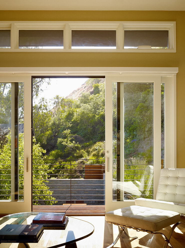 Inspiration for a timeless living room remodel in San Francisco with yellow walls