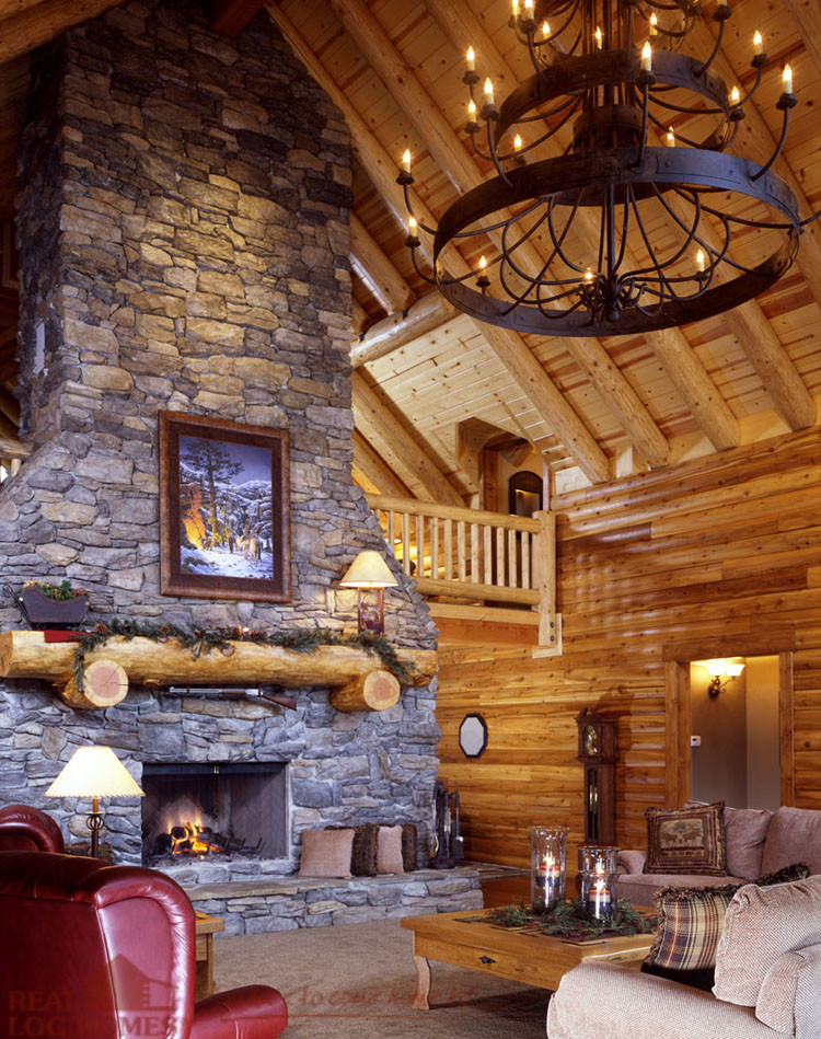 Foto de salón rural con suelo de madera en tonos medios, todas las chimeneas y marco de chimenea de piedra