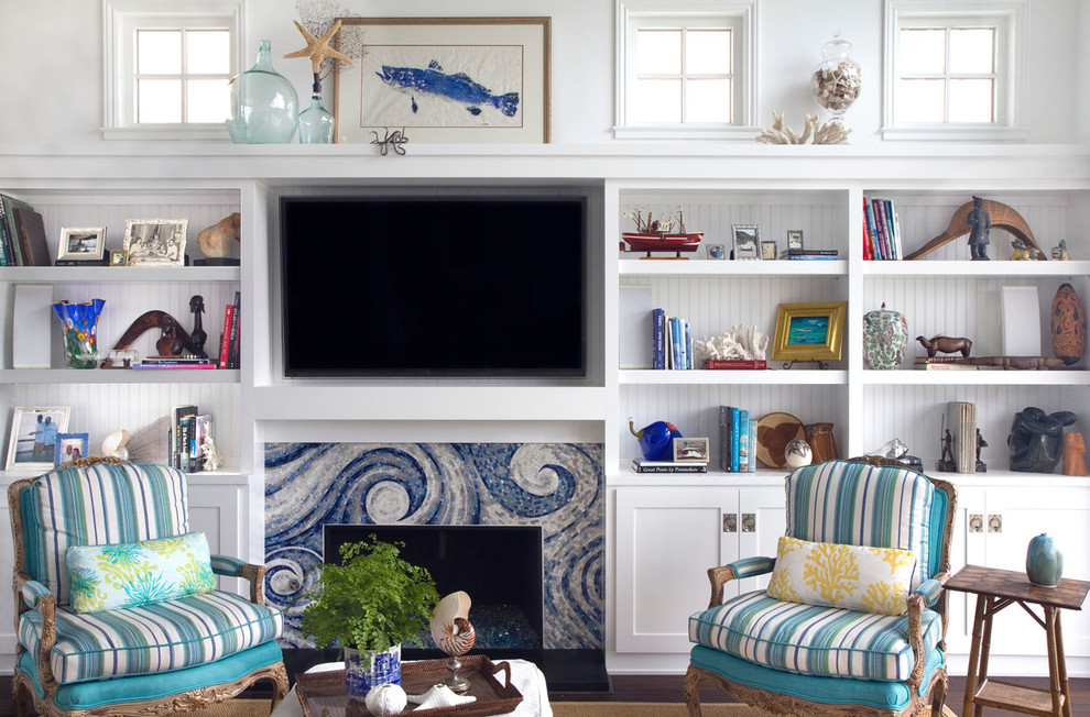 Beach style dark wood floor living room photo in San Diego with white walls, a standard fireplace, a tile fireplace and a wall-mounted tv
