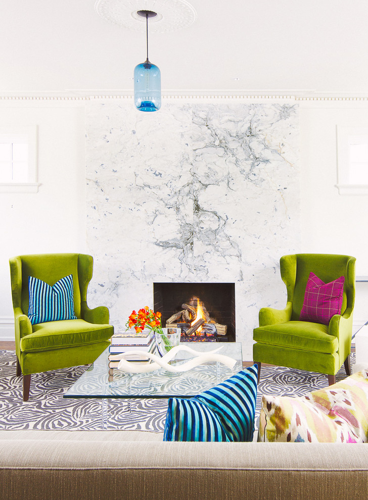Inspiration for a mid-sized contemporary formal and enclosed medium tone wood floor living room remodel in Toronto with white walls, a standard fireplace and a stone fireplace